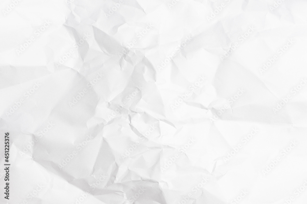 Obraz premium White crumpled paper texture background.