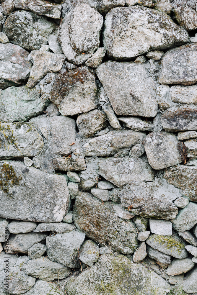 Texture of an old wall made of stones Texture of an old wall made of stones