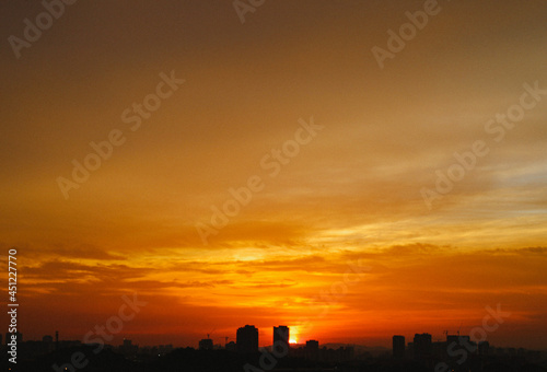 Golden sunset over buildings