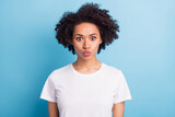 Photo of young beautiful good mood amazed girl pout lips wear white t-shirt isolated on blue color background