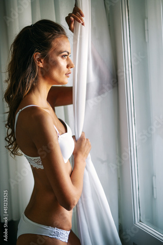 Beautiful alluring woman in sexy lingerie with glamorous face © NDABCREATIVITY