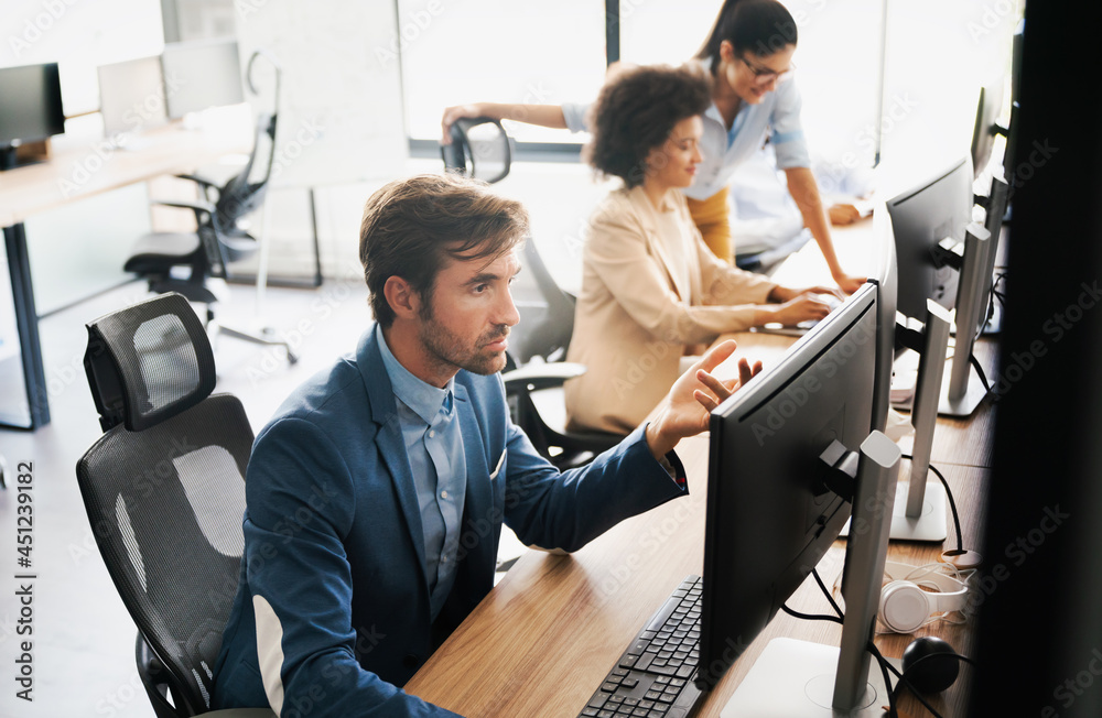 Programmer working in a software developing company Programmer working in a software developing company