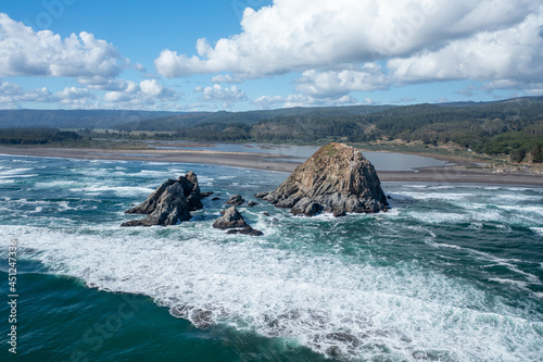 Topocalma, o'higgins, chile, horizontal aerial photo with drone of the sea, beach and forest photo