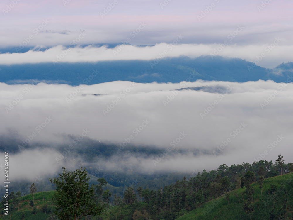 soft-focused image of morning fog cloud covered mountain view in Chiangmai, Thailand