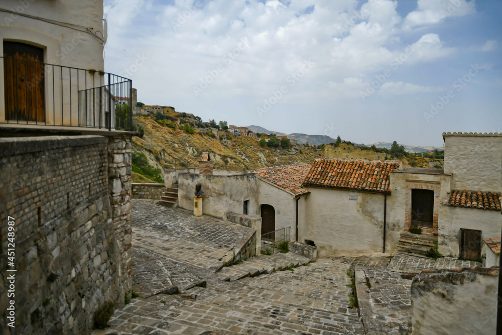 Obraz premium A street in the historic center of Aliano, a old town in the Basilicata region, Italy.