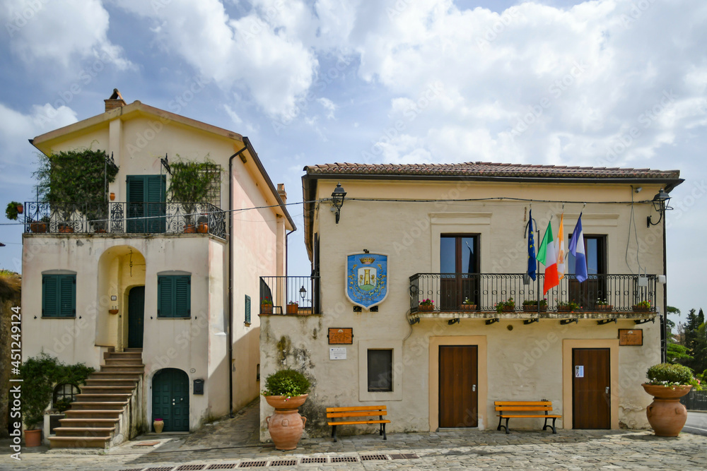 Fototapeta premium A square with the building of the town hall in the historic center of Aliano, a medieval town in the Basilicata region, Italy.