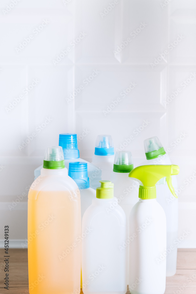 House cleaning products pile on white background. Cleaning concept, cleaning supplies. House cleaning products pile on white background. Cleaning concept, cleaning supplies.