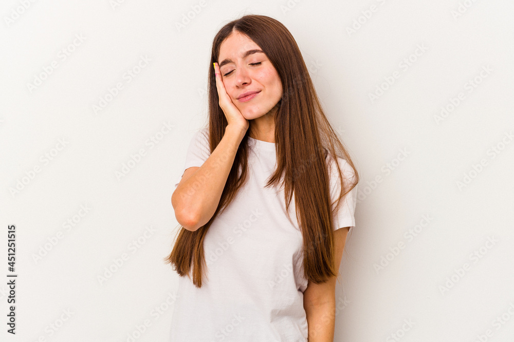 Young caucasian woman isolated on white background who is bored, fatigued and need a relax day. Young caucasian woman isolated on white background who is bored, fatigued and need a relax day.