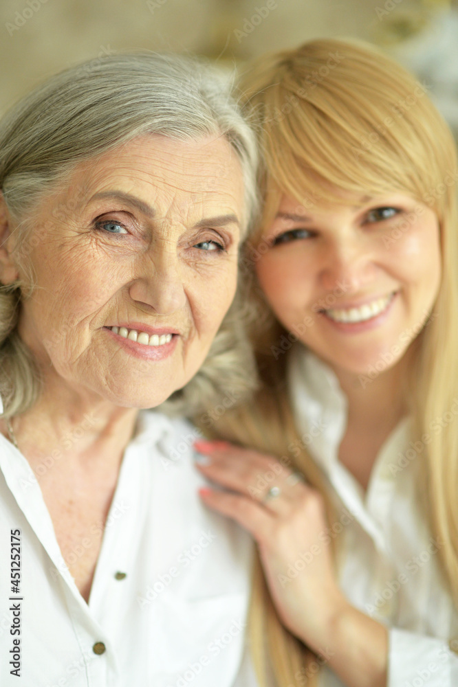 Portrait of Senior woman with daughter at home Portrait of Senior woman with daughter at home