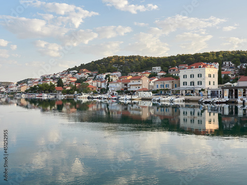 Tisno, Croatia - City landscape in the morning overlooking the marina with boats. Murter Island.