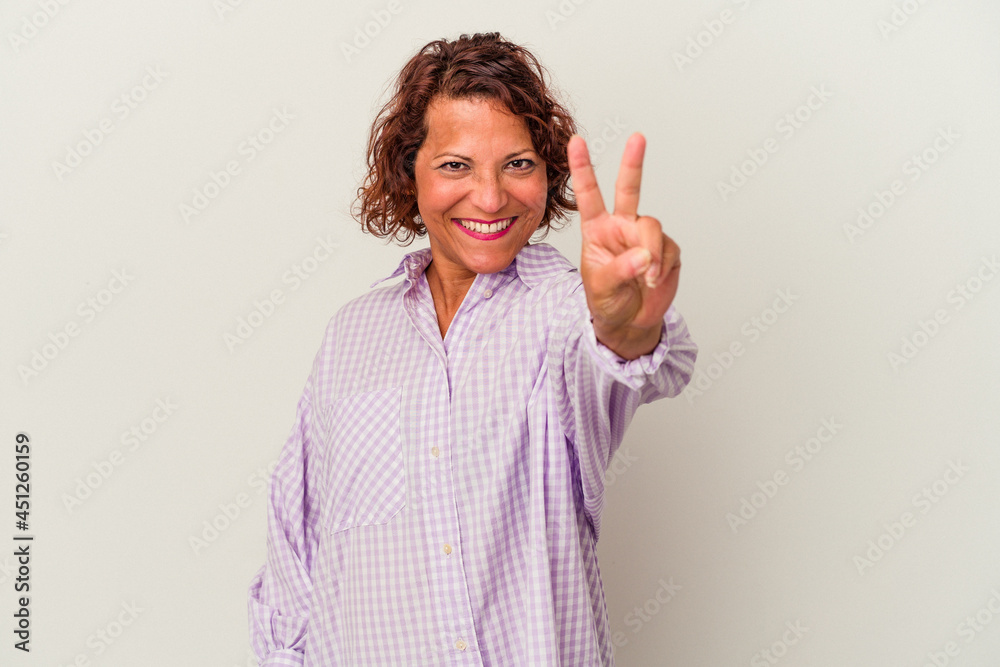 Middle age latin woman isolated on white background showing number two with fingers. Middle age latin woman isolated on white background showing number two with fingers.