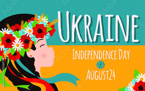 Independence Day of Ukraine, celebrated on August 24. Happy Ukrainian woman in a traditional flower wreath with ribbons. National flag background.