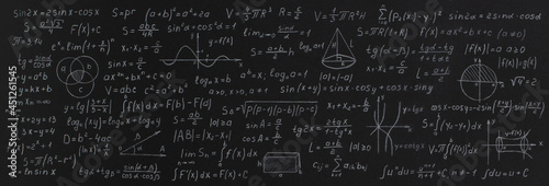 Formulas and calculations from mathematics and geometry on school blackboard