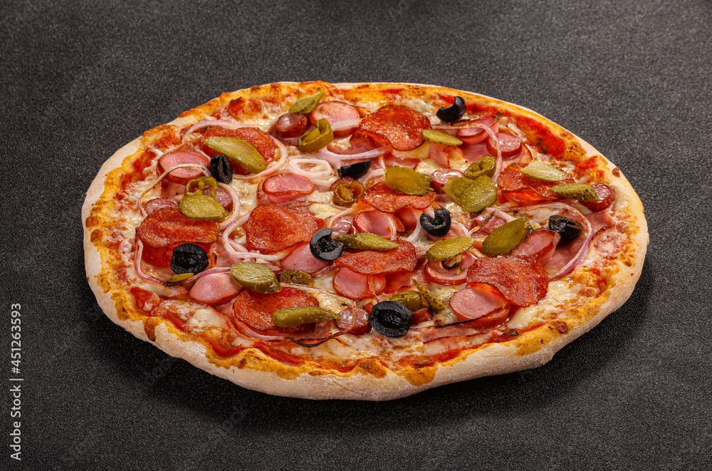 Italian traditional Pizza with sausages Italian traditional Pizza with sausages
