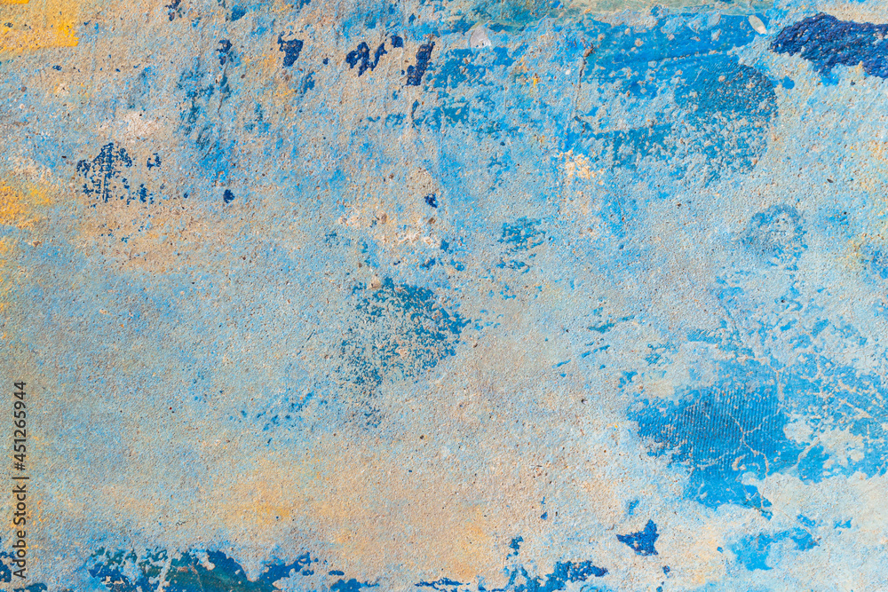 Old blue cracked paint the old wall background, Painted concrete wall. Abstract background. Art texture. Colorful modern artwork. Modern art. Contemporary art. Artistic wall paint.