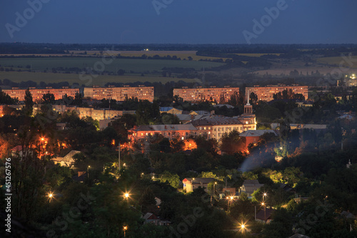 A bird's-eye view of the city at night. Bright lights of a big city in Eastern Europe