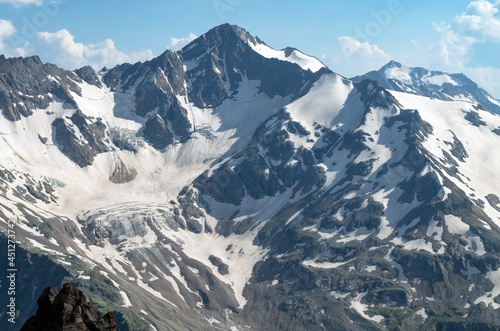 landscape with the Caucasus mountains. Snow-capped peaks of the mountains from a height.