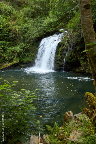 Fototapeta Naklejka Na Ścianę i Meble -  Beautiful waterfall hidden in a remote part of Galicia, Spain.