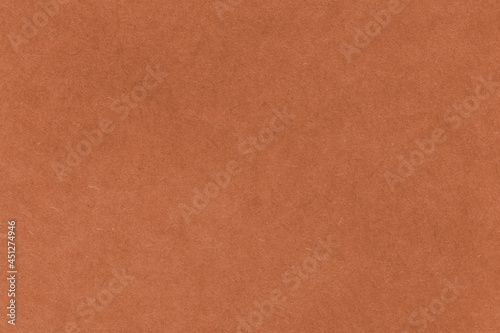 Brown cardboard paper craft texture. Brown background.