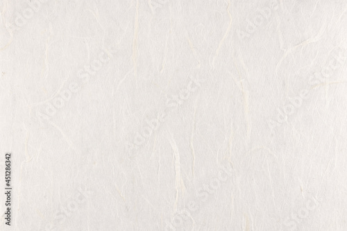 Decorative yunlong kam paper texture. Thin silk fibers decorated paper background. Landscape horizontal orientation. photo