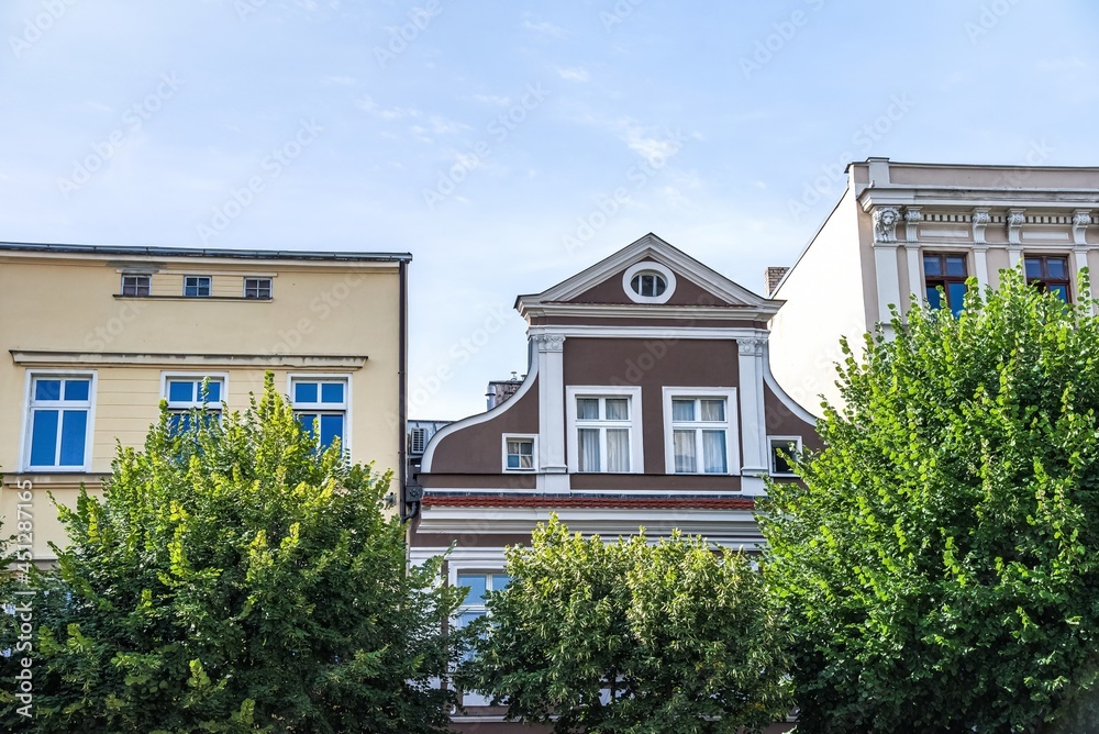 Facade of an old residential building on the street of the city, the historical center of Poland Facade of an old residential building on the street of the city, the historical center of Poland