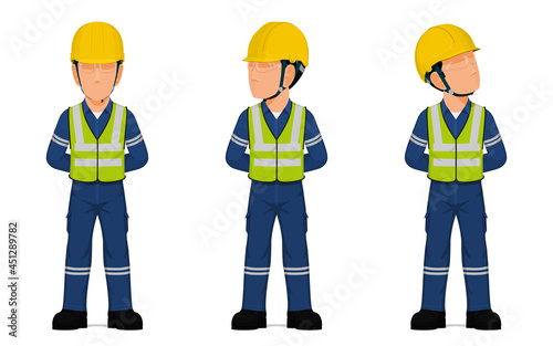 set of industrial workers in the position of parade rest.