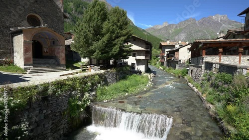 The picturesque village of Chianale on a sunny summer morning, in the Varaita Valley, Piedmont, northern Italy. photo