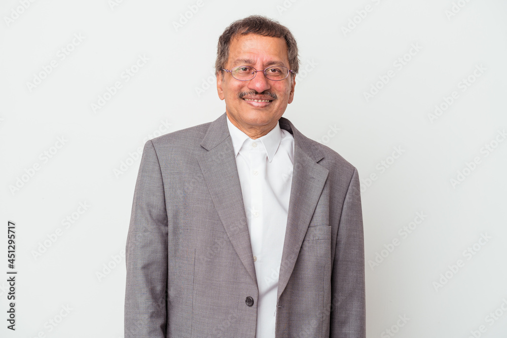 Middle aged indian business man isolated on white background happy, smiling and cheerful. Middle aged indian business man isolated on white background happy, smiling and cheerful.