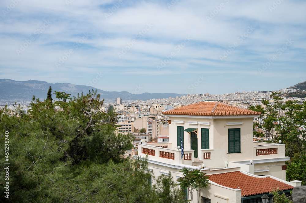Cityscape of Athens at cloudy day. City near mountain. Urban architecture in Europe. View from top. Cityscape of Athens at cloudy day. City near mountain. Urban architecture in Europe. View from top.
