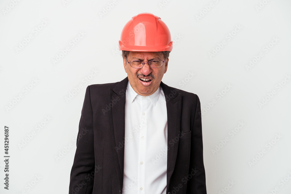 Middle aged indian architect man isolated on white background screaming very angry and aggressive. Middle aged indian architect man isolated on white background screaming very angry and aggressive.