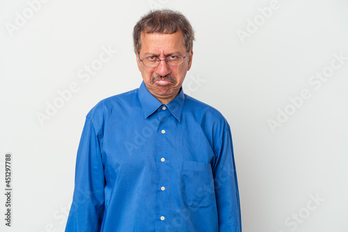 Obraz na plátně Middle aged indian man isolated on white background sad, serious face, feeling miserable and displeased