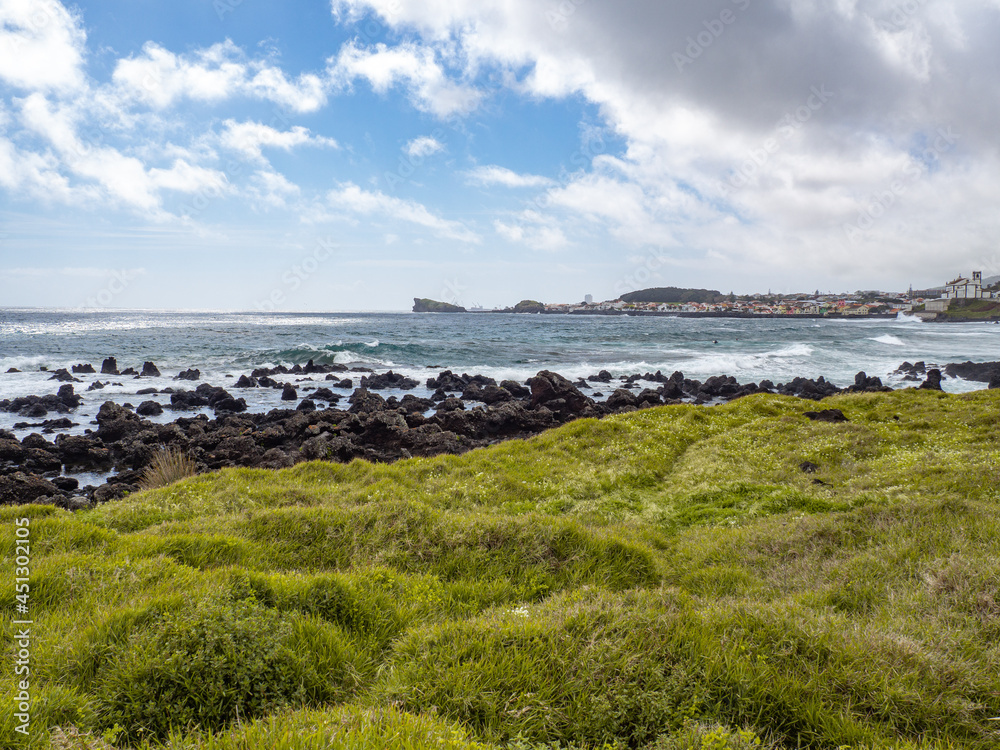 landscape of peaceful beach in shore with rocks and waves in blue ocean next to city in island of são miguel, açores, azores, portugal
landscape of peaceful beach in shore with rocks and waves in blue ocean next to city in island of são miguel, açores, azores, portugal