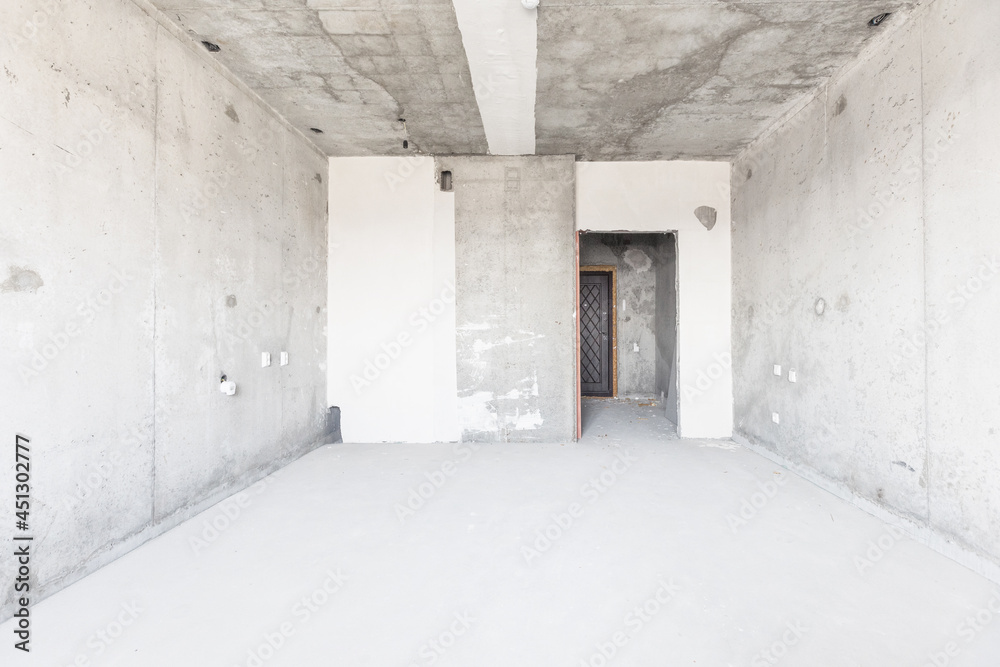 Fototapeta premium interior of the apartment without decoration in gray colors