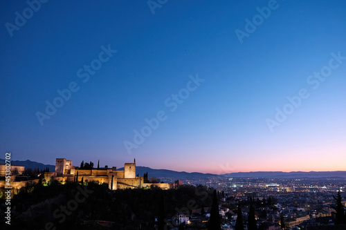 Night view of the city of Granada with the Alhambra in the center of the photo © Daniel