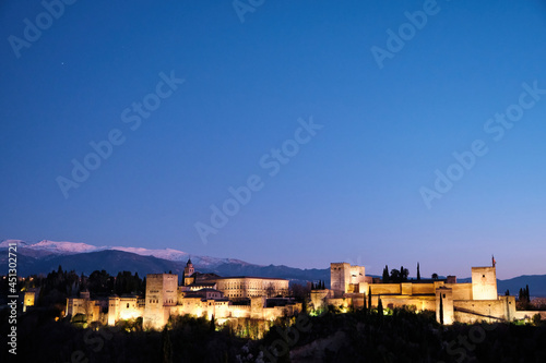 Night view of the city of Granada with the Alhambra in the center of the photo