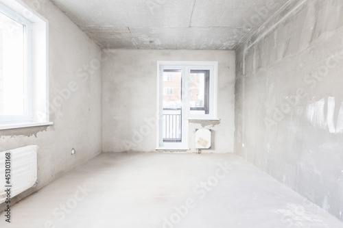 interior of the apartment without decoration in gray colors