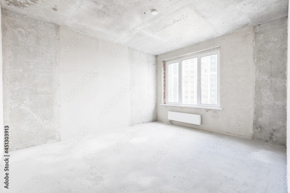 Fototapeta premium interior of the apartment without decoration in gray colors