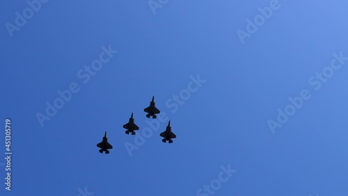 four jets commence a flyover on the 4th of july