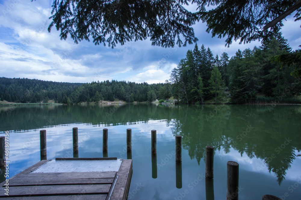 Mountain lake Tret in summer  in trentino, Italy