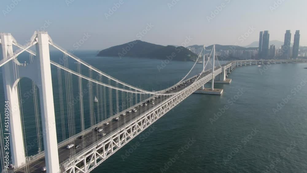 Aerial view of Gwangandaegyo bridge in Busan. May, 2021. 광안대교. Aerial view of Gwangandaegyo bridge in Busan. May, 2021. 광안대교.