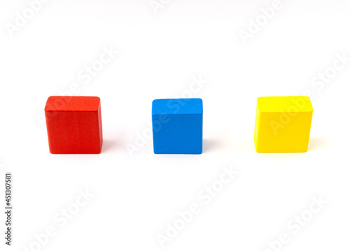 Multicolor toy wooden blocks isolated on white background.