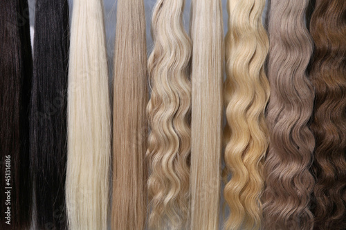 Hair samples for extensions from light to dark photo
