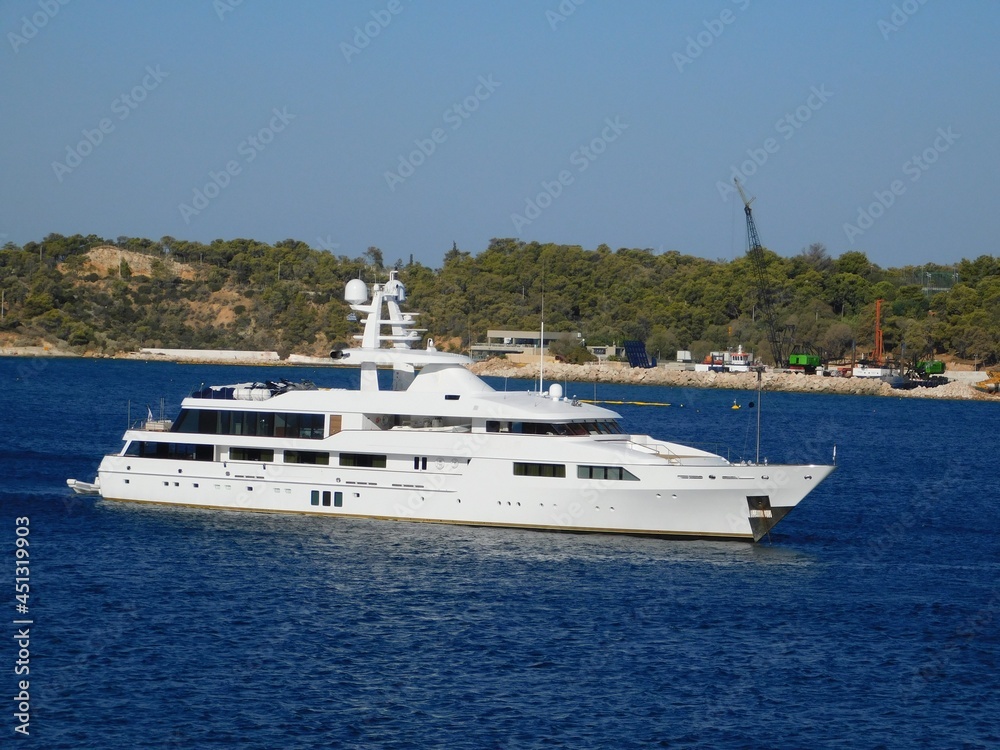 A luxury yacht off the coast of Vouliagmeni in Attica, Greece