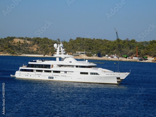 A luxury yacht off the coast of Vouliagmeni in Attica, Greece © Konstantinos