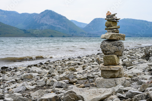 Rock cairn on the beach of Jackson Lake, Grand Teton National Park, WY 