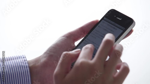 man scrolling and using phone