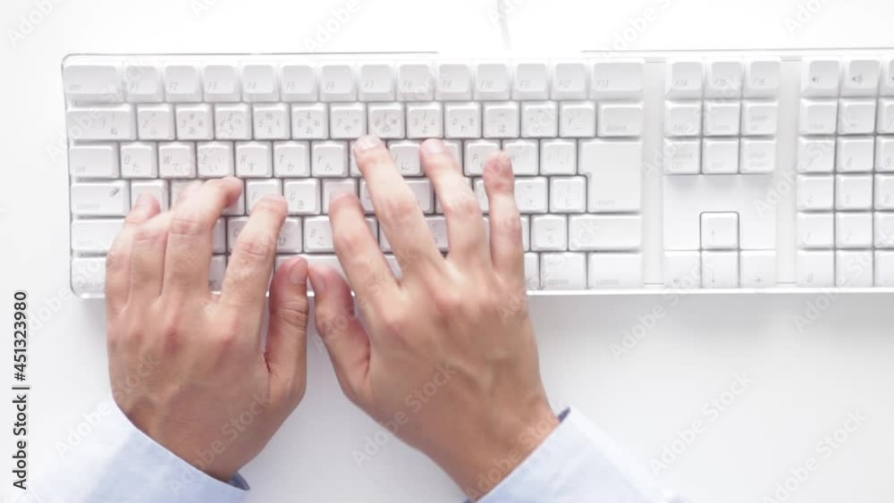 man using keyboard and working man using keyboard and working