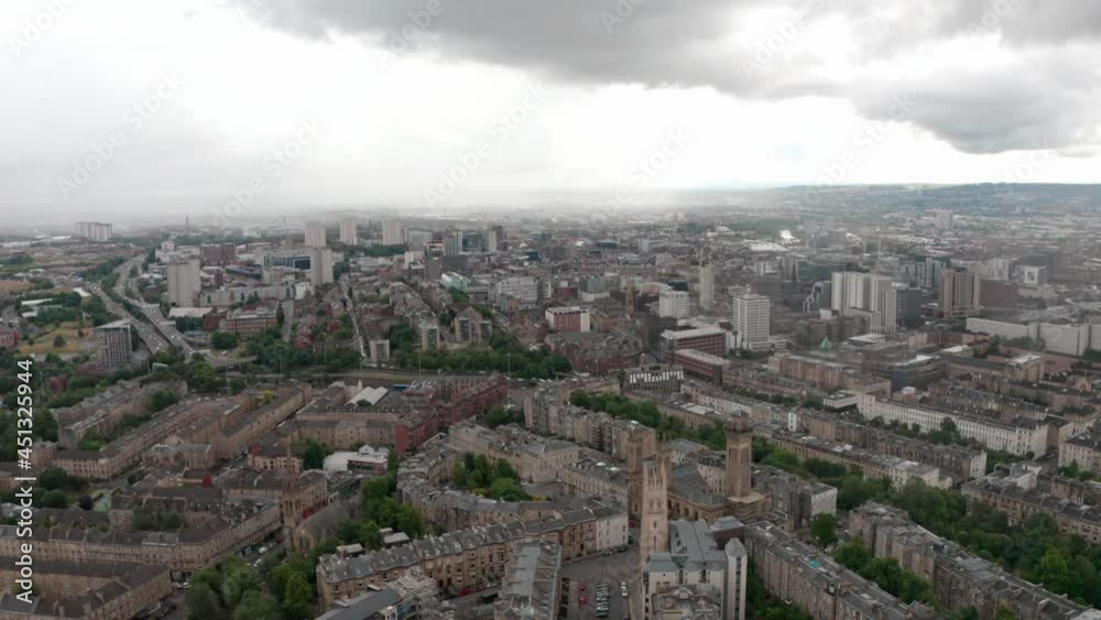 Rising dolly forward drone shot over north central Glasgow Rising dolly forward drone shot over north central Glasgow