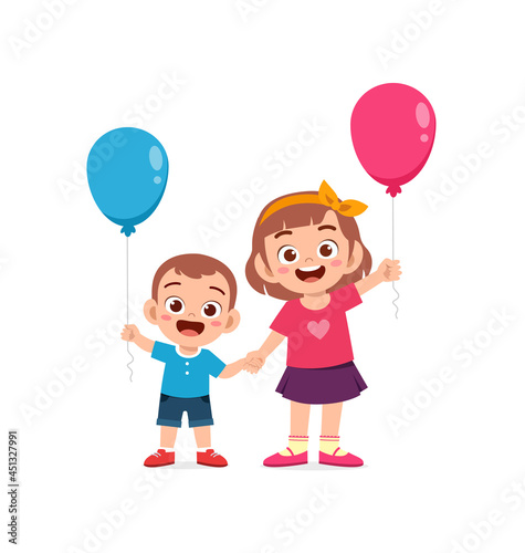 cute little girl play balloon with baby sibling