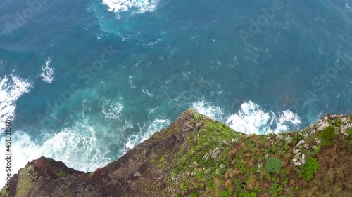 4K drone footage camera starting moving over coast and farther over sea. Environment, nature, landscapes concept.